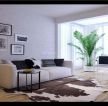 现代设计风格家庭休闲区双人沙发背景墙装饰图