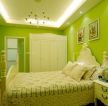70平两室两厅卧室绿色墙面装修效果图