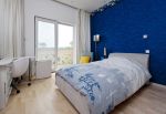 现代别墅设计卧室深蓝色墙壁效果图