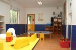 幼儿园室内浅黄色木地板装修效果图