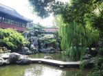 中式园林景观元素假山鱼池装修图
