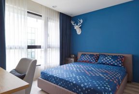 2023时尚家居卧室蓝色墙面装修效果图片