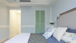 现代简约混搭风格卧室蓝色墙面装修效果图片