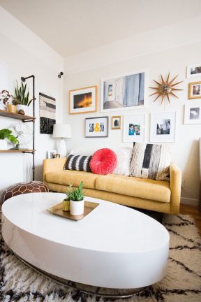 50平米单身公寓小客厅白色茶几装修效果图片
