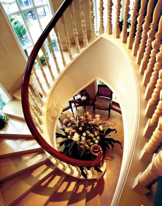 2023简约家庭旋转楼梯混搭风格设计图