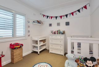 白色欧式儿童房家具摆放效果图片