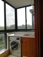 2023高层阳台洗衣机柜子装修效果图