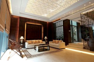 新中式风格错层客厅沙发背景墙装修设计图