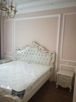 2023家庭卧室床头粉色背景墙装修实景图