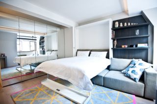 2023简约迷你小公寓客厅收纳床设计图片