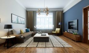 现代简约风格122平三居客厅蓝色电视墙装修效果图