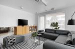 房屋客厅灰色布艺沙发摆放设计效果图