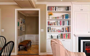 美式风格138平米三居客厅书柜装修实景图