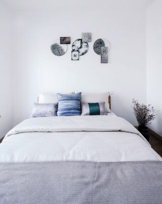 现代简约卧室床头设计效果图