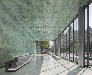 快捷酒店大堂艺术玻璃墙面装修效果图欣赏