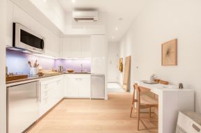 简约厨房浅黄色木地板装修设计效果图片