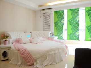 女生卧室简单装修圆形床效果图片