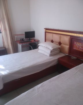 旅馆装修效果图 卧室床的摆放