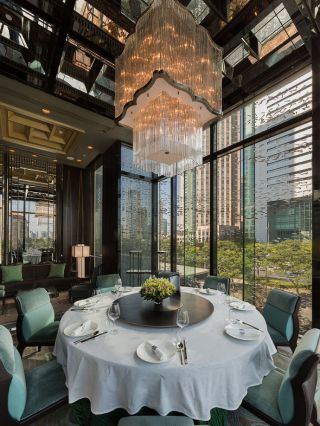 小型酒店餐厅圆餐桌装修效果图片欣赏