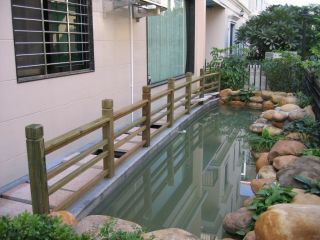 入户露天阳台花园设计假山水池图片