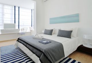 现代小房间卧室布置地毯装修效果图片