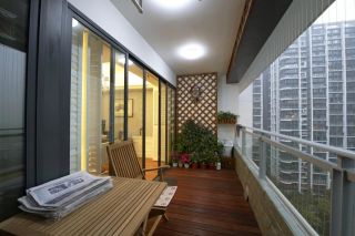 家装阳台设计深棕色木地板装修效果图片