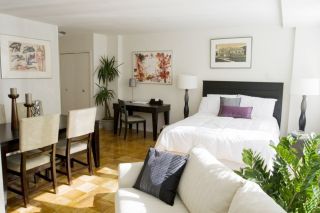 小户型客厅卧室仿木地板瓷砖图片