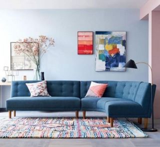 北欧温馨客厅半圆形沙发装潢设计图