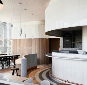 咖啡厅半弧形吧台装修案例-每日推荐