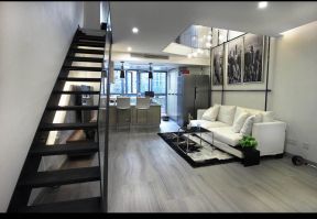 2023现代复式楼客厅白色沙发装修效果图