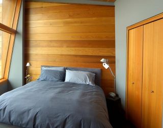 极简卧室床头背景墙木质设计图片