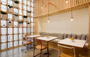 2020木质隔断墙效果图 2020日式咖啡店设计