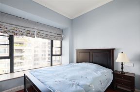2023家庭温馨卧室蓝色背景墙装修图片