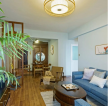 现代中式风格客厅蓝色沙发装修设计图片