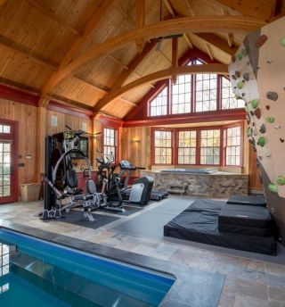 2023美式别墅家庭健身房室内游泳池设计图片