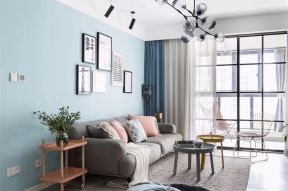 北欧风格客厅沙发蓝色墙装修设计图片
