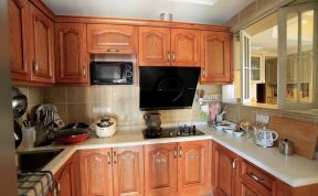 美式风格三居室厨房橱柜吊柜设计效果图