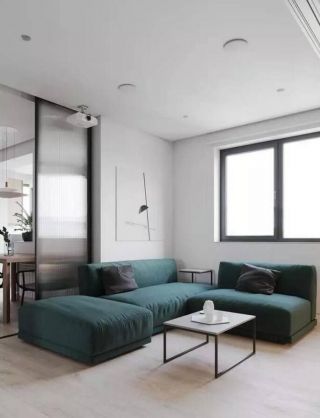 单身公寓样板房客厅绿色布艺沙发装修欣赏