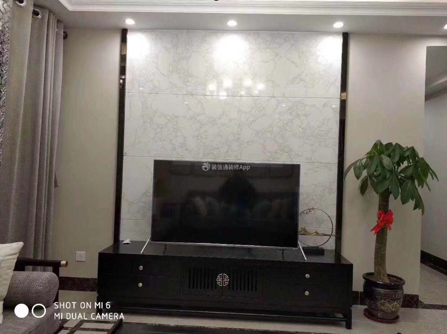 109平米四居新中式风格客厅电视墙装修图片