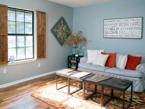 2023家装小客厅沙发浅蓝色背景墙设计图片