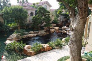 深圳假山鱼池设计 如何让庭院更有灵气
