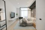 白桦林65平现代风格家庭卧室电视墙设计效果图