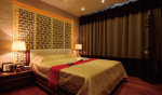 保利狮子湖东南亚120平三居室卧室装修案例
