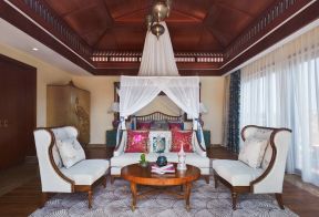 紫荆花园145平米四居室东南亚风格卧室沙发装修设计效果图