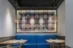 广州特色茶餐厅背景墙装修设计图片2023