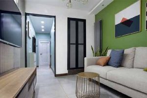 温州装修案例分享：紧凑的一居室空间，绿色沙发墙特别醒目，有品位的简约风格装修！