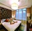 东南亚风格三居室卧室装修实景图