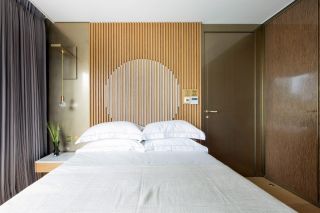 110平米住宅现代卧室背景墙装修设计效果图