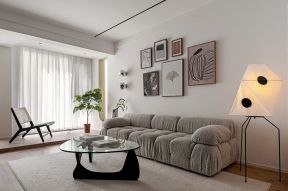 现代北欧风格客厅沙发背景墙装饰效果图
